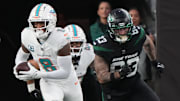 Jevon Holland of Miami returned this interception for a 100 yard TD in the first half as the Miami Dolphins defeated the NY Jets 34-13 at MetLife Stadium on November 24, 2023 in East Rutherford, NJ to play in the first Black Friday NFL game.