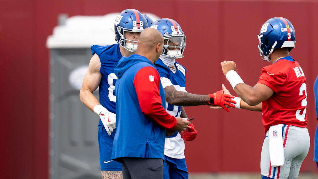 Ihmir Smith-Marsette, wide receiver, and Russell Wilson, quarterback with the NY Giants, greet each other during practice at Quest Diagnostics Training Center, East Rutherford, NJ, May 28, 2025.