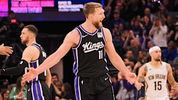 Feb 8, 2025; Sacramento, California, USA; Sacramento Kings center Domantas Sabonis (11) celebrates with teammates after a play against the New Orleans Pelicans during the fourth quarter at Golden 1 Center. Mandatory Credit: Kelley L Cox-Imagn Images