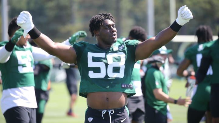 Defensive lineman Carl Lawson loosens up during the opening day of the 2022 New York Jets Training Camp in Florham Park, NJ on July 27, 2022.

Opening Of The 2022 New York Jets Training Camp In Florham Park Nj On July 27 2022
