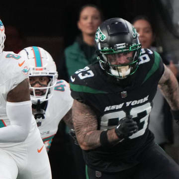 Miami Dolphins safety Jevon Holland returned this interception for a 100 yard TD in the first half of the Miami Dolphins victory agains the New York Jets at MetLife Stadium on Black Friday in 2023.