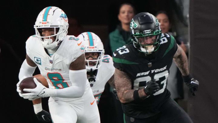 Miami Dolphins safety Jevon Holland returned this interception for a 100 yard TD in the first half of the Miami Dolphins victory agains the New York Jets at MetLife Stadium on Black Friday in 2023.