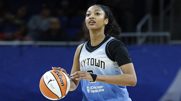 Sep 3, 2025; Chicago, Illinois, USA; Chicago Sky forward Angel Reese (5) brings the ball up court against the Connecticut Sun during the second half at Wintrust Arena. Mandatory Credit: Kamil Krzaczynski-Imagn Images