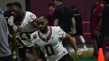 Florida State football receivers Darrion Williamson (21) and Ja'Khi Douglas take part in the final Tour of Duty winter workouts ahead of 2024 spring practices on Thursday, March 7, 2024.