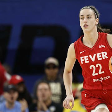 Aug 30, 2024; Chicago, Illinois, USA; Indiana Fever guard Caitlin Clark (22) brings the ball up court against the Chicago Sky during the first half at Wintrust Arena. Mandatory Credit: Kamil Krzaczynski-Imagn Images