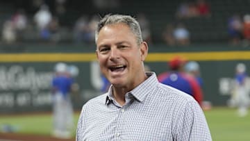 Jun 21, 2024; Arlington, Texas, USA; Texas Rangers general manager Chris Young (left) and Kansas City Royals general manager J.J. Picollo (right) talk before the game against the Kansas City Royals at Globe Life Field. Mandatory Credit: Jim Cowsert-Imagn Images