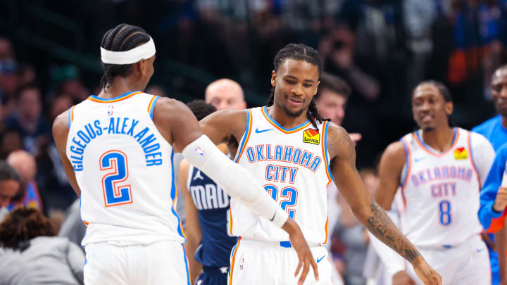 May 11, 2024; Dallas, Texas, USA; Oklahoma City Thunder guard Cason Wallace (22) celebrates with Oklahoma City Thunder guard Shai Gilgeous-Alexander (2) after scoring during the first half against the Dallas Mavericks during game three of the second round for the 2024 NBA playoffs at American Airlines Center. Mandatory Credit: Kevin Jairaj-USA TODAY Sports