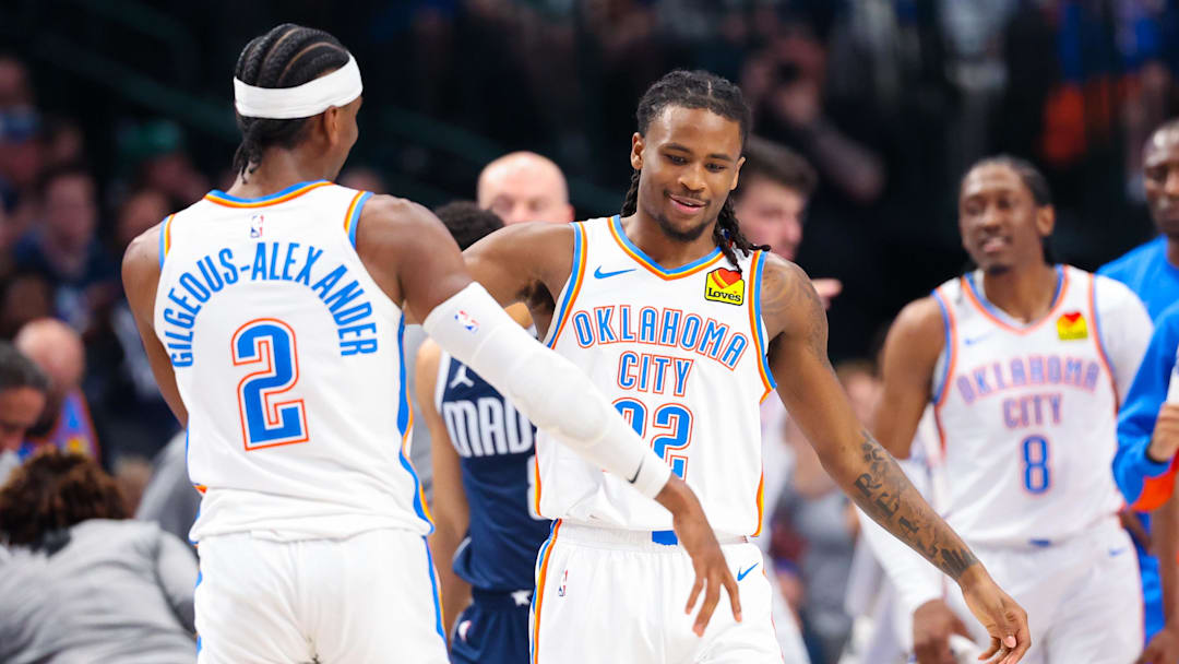 May 11, 2024; Dallas, Texas, USA; Oklahoma City Thunder guard Cason Wallace (22) celebrates with Oklahoma City Thunder guard Shai Gilgeous-Alexander (2) after scoring during the first half against the Dallas Mavericks during game three of the second round for the 2024 NBA playoffs at American Airlines Center. Mandatory Credit: Kevin Jairaj-Imagn Images