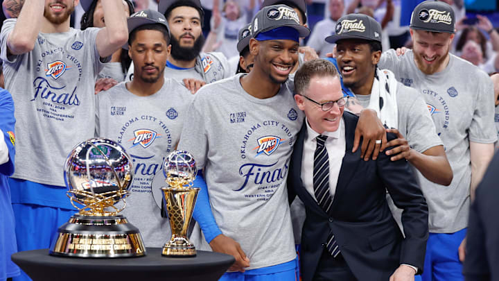 May 28, 2025; Oklahoma City, Oklahoma, USA; Oklahoma City Thunder guard Shai Gilgeous-Alexander hugs Oklahoma City Thunder executive vice president and general manager Sam Presti after their team defeated the Minnesota Timberwolves in game five of the western conference finals for the 2025 NBA Playoffs at Paycom Center. Mandatory Credit: Alonzo Adams-Imagn Images