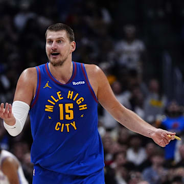 May 9, 2025; Denver, Colorado, USA; Denver Nuggets center Nikola Jokic (15) reacts to a foul called in the first half against the Oklahoma City Thunder during game three of the second round for the 2025 NBA Playoffs at Ball Arena. Mandatory Credit: Ron Chenoy-Imagn Images