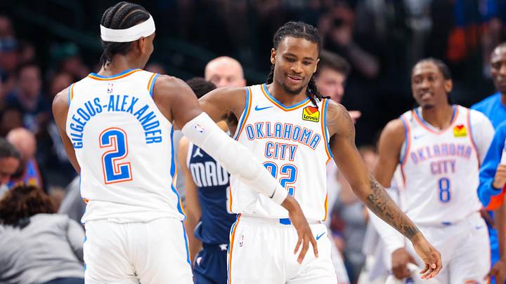 May 11, 2024; Dallas, Texas, USA; Oklahoma City Thunder guard Cason Wallace (22) celebrates with Oklahoma City Thunder guard Shai Gilgeous-Alexander (2) after scoring during the first half against the Dallas Mavericks during game three of the second round for the 2024 NBA playoffs at American Airlines Center. Mandatory Credit: Kevin Jairaj-Imagn Images