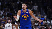 Denver Nuggets center Nikola Jokic reacts to a foul called against the Oklahoma City Thunder in the 2025 NBA Playoffs.