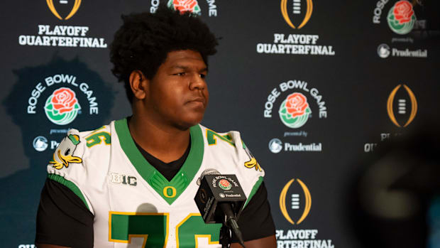 Oregon offensive lineman Josh Conerly Jr. speaks during media day for the Oregon Ducks in Los Angeles ahead of the Rose Bowl 