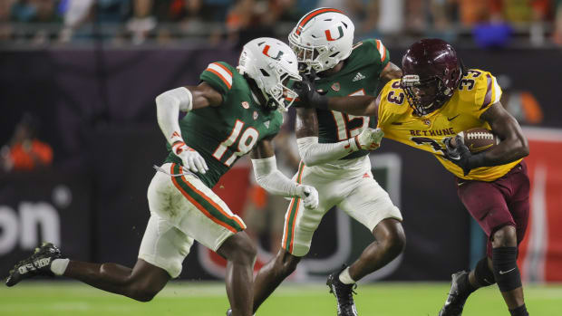 Miami Gardens, Florida, USA; Bethune Cookman Wildcats running back Jaiden Bivens (33) runs with the football ahead of Miami H