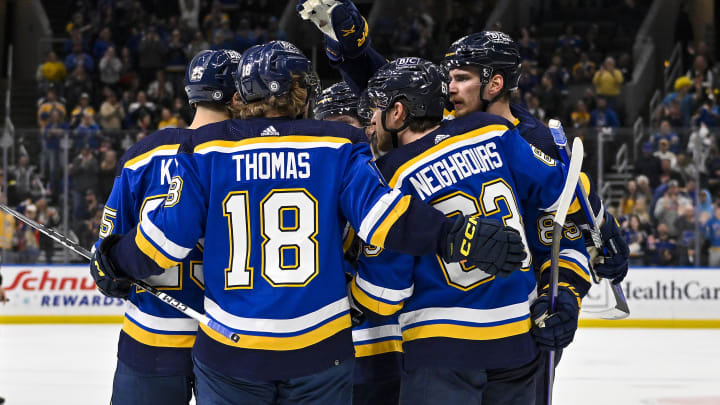 Mar 28, 2024; St. Louis, Missouri, USA;  St. Louis Blues left wing Pavel Buchnevich (89) is congratulated by teammates after scoring against the Calgary Flames during the second period at Enterprise Center. Mandatory Credit: Jeff Curry-USA TODAY Sports