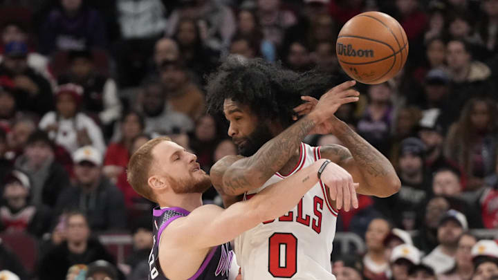 Dec 29, 2025; Chicago, Illinois, USA; Minnesota Timberwolves guard Donte Divincenzo (0) defends Chicago Bulls guard Coby White (0) during the first half at United Center. Mandatory Credit: David Banks-Imagn Images