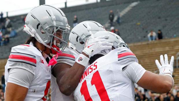 Wide receivers celebrate after a touchdown.