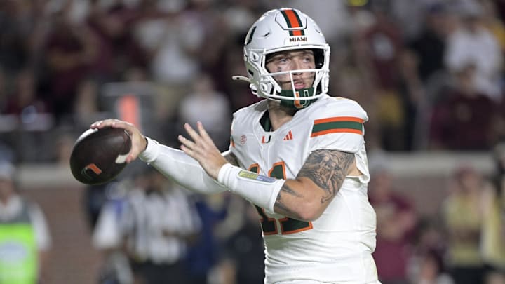 Oct 4, 2025; Tallahassee, Florida, USA; Miami Hurricanes quarterback Carson Beck (11) throws during the second half against the Florida State Seminoles at Doak S. Campbell Stadium. Mandatory Credit: Melina Myers-Imagn Images
