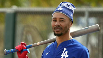 Feb 11, 2025; Glendale, AZ, USA; Los Angeles Dodgers shortstop Mookie Betts (50) takes batting practice during spring training camp. Mandatory Credit: Rick Scuteri-Imagn Images