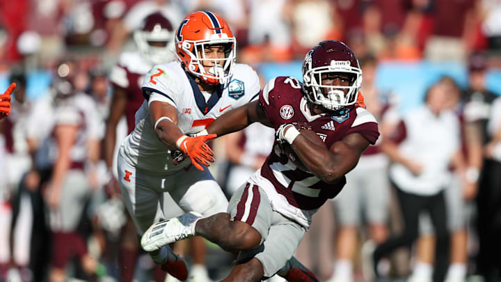 Jan 2, 2023; Tampa, FL, USA; Illinois Fighting Illini defensive back Matthew Bailey (2) chases Mississippi State Bulldogs running back Simeon Price (22) during the 2023 ReliaQuest Bowl at Raymond James Stadium. Mandatory Credit: Nathan Ray Seebeck-Imagn Images