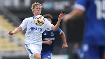 MLS NEXT East midfielder Colin Guske of Orlando City SC (10) controls the ball  