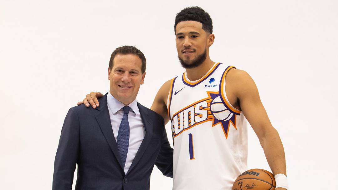 Oct 2, 2023; Phoenix, AZ, USA; Phoenix Suns owner Mat Ishbia (left) and guard Devin Booker pose for a portrait during media day at Footprint Center. Mandatory Credit: Mark J. Rebilas-Imagn Images