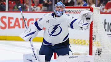 Apr 26, 2025; Sunrise, Florida, USA; Tampa Bay Lightning goaltender Andrei Vasilevskiy (88) makes a save against the Florida Panthers in the first period during game three of the first round of the 2025 Stanley Cup Playoffs at Amerant Bank Arena. Mandatory Credit: Nathan Ray Seebeck-Imagn Images