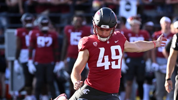 Sep 9, 2023; Pullman, Washington, USA; Washington State Cougars place kicker Dean Janikowski (49) kicks a field goal against the Wisconsin Badgers in the first half at Gesa Field at Martin Stadium. Mandatory Credit: James Snook-USA TODAY Sports