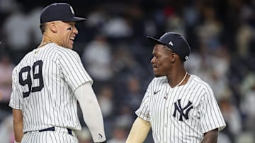 New York Yankees designated hitter Aaron Judge (99) and second baseman Jazz Chisholm Jr. (13) celebrate after defeating the Washington Nationals 10-5 at Yankee Stadium on Aug. 25.