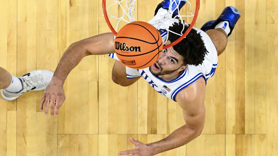 Duke forward Cameron Boozer attempts to grab a rebound against Siena.