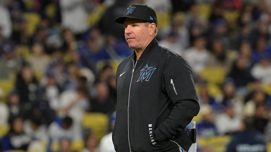  Miami Marlins manager Clayton McCullough (86) returns to the dugout after a pitching change against the Los Angeles Dodgers at Dodger Stadium. 