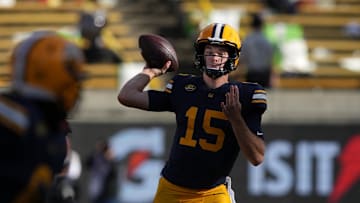 Nov 23, 2024; Berkeley, California, USA; California Golden Bears quarterback Fernando Mendoza (15) throws a pass against the Stanford Cardinal during the second quarter at California Memorial Stadium. Mandatory Credit: Darren Yamashita-Imagn Images