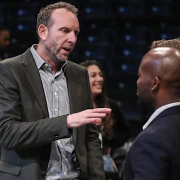 Feb 29, 2024; Brooklyn, New York, USA;  Brooklyn Nets General Manager Sean Marks speaks to a group of people prior to the game against the Atlanta Hawks at Barclays Center. Mandatory Credit: Wendell Cruz-Imagn Images