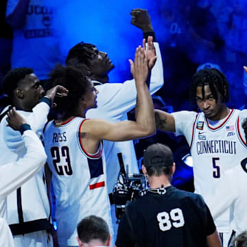 Connecticut Huskies guard Stephon Castle (5) is introduced before the national championship game of the Final Four of the 2024 NCAA Tournament against the Purdue Boilermakers at State Farm Stadium in Glendale on April 8, 2024.