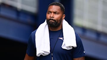 Jul 24, 2024; Foxborough, MA, USA;  New England Patriots head coach Jerod Mayo walks to the podium for a press conference before training camp at Gillette Stadium.