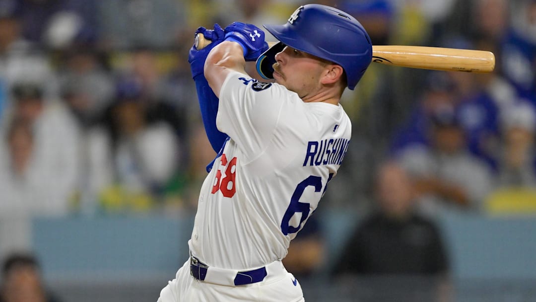 May 15, 2025; Los Angeles, California, USA; Los Angeles Dodgers catcher Dalton Rushing (68) singles against the Athletics during the third inning of the game at Dodger Stadium in Los Angeles on May 15, 2025. May 15, 2025; Los Angeles, California, USA; Los Angeles Dodgers catcher Dalton Rushing (68) singles against the Athletics during the third inning of the game at Dodger Stadium in Los Angeles on May 15, 2025.
