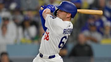 May 15, 2025; Los Angeles, California, USA; Los Angeles Dodgers catcher Dalton Rushing (68) singles against the Athletics during the third inning of the game at Dodger Stadium in Los Angeles on May 15, 2025.