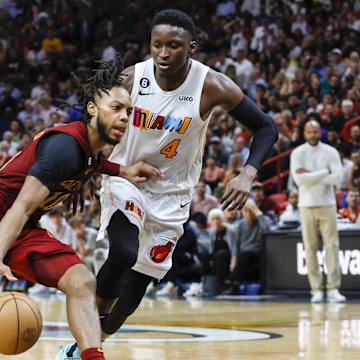 Mar 8, 2023; Miami, Florida, USA; Cleveland Cavaliers guard Darius Garland (10) drives to the basket as Miami Heat guard Victor Oladipo (4) defends during the fourth quarter at Miami-Dade Arena. Mandatory Credit: Sam Navarro-Imagn Images