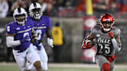 Nov 5, 2022; Louisville, Kentucky, USA;  Louisville Cardinals running back Jawhar Jordan (25) runs the ball against the James Madison Dukes during the second half at Cardinal Stadium. Louisville won 34-10. Mandatory Credit: Jamie Rhodes-Imagn Images
