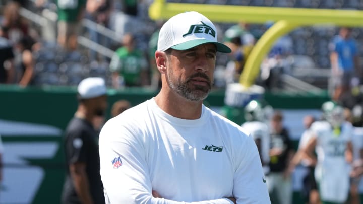 Aaron Rodgers, who wasn't dressed to play, during pre game warm ups as the Washington Commanders came to MetLife Stadium to play the New York Jets.