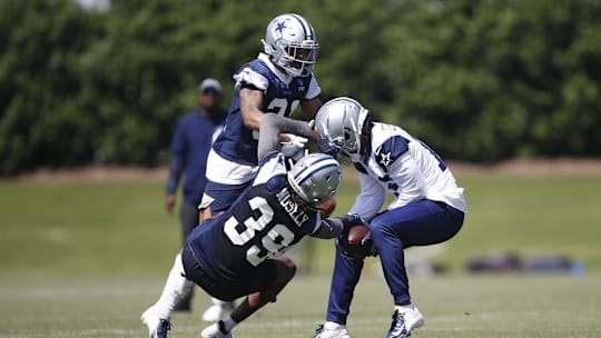 Dallas Cowboys cornerback Quandre Mosely defends against wide receiver Dontario Drummond at rookie minicamp. 