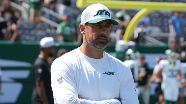 East Rutherford, NJ -- August 10, 2024 -- Aaron Rodgers, who wasn't dressed to play, during pre game warm ups as the Washington Commanders came to MetLife Stadium to play the New York Jets in the first preseason game of the 2024 season.