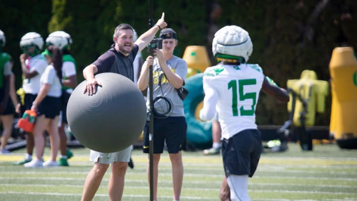 Oregon head coach Dan Lanning yells to wide receiver Tez Johnson during practice with the Oregon Ducks Friday, Aug. 9, 2024 at the Hatfield-Dowlin Complex in Eugene, Ore.