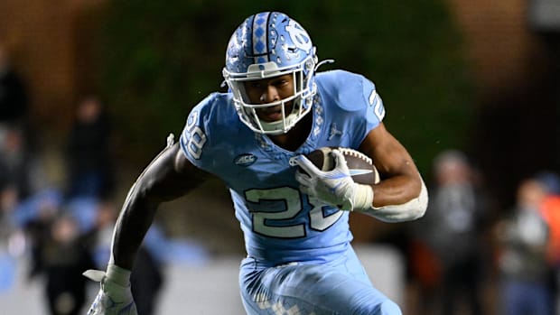North Carolina Tar Heels running back Omarion Hampton (28) runs 