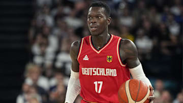 Germany point guard Dennis Schroder dribbles the ball during the first half.