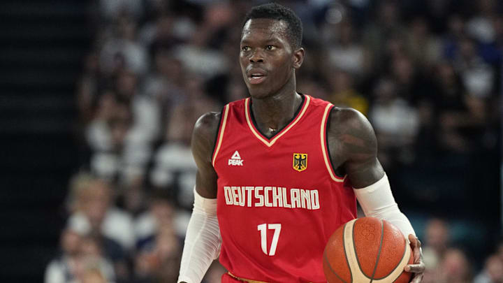 Germany point guard Dennis Schroder dribbles the ball during the first half. Germany point guard Dennis Schroder dribbles the ball during the first half.