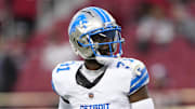 Detroit Lions safety Kerby Joseph warms up for a game.