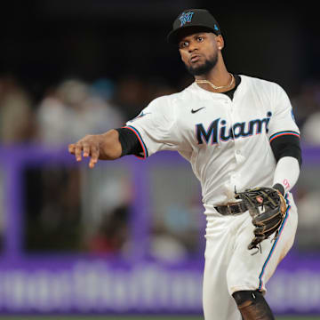 Apr 1, 2025; Miami, Florida, USA; Miami Marlins second baseman Otto Lopez (6) throws to first base to retire New York Mets first baseman Pete Alonso (not pictured) during the sixth inning at loanDepot Park. Mandatory Credit: Sam Navarro-Imagn Images