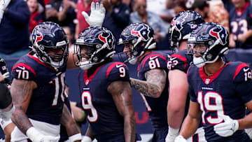 Houston Texans tight end Brevin Jordan (9) celebrates his touchdown against the Tennessee Titans during the second quarter at NRG Stadium.