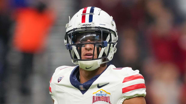 Arizona Wildcats wide receiver Tetairoa McMillan (4) runs onto the field. Daniel Dunn-USA TODAY Sports